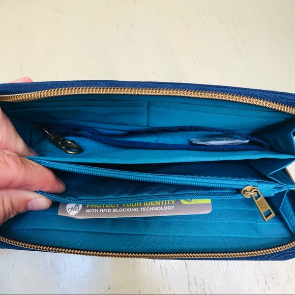 Travelon Bags Travelon Rfid Navy Zip Around Wallet Nwt Poshmark
